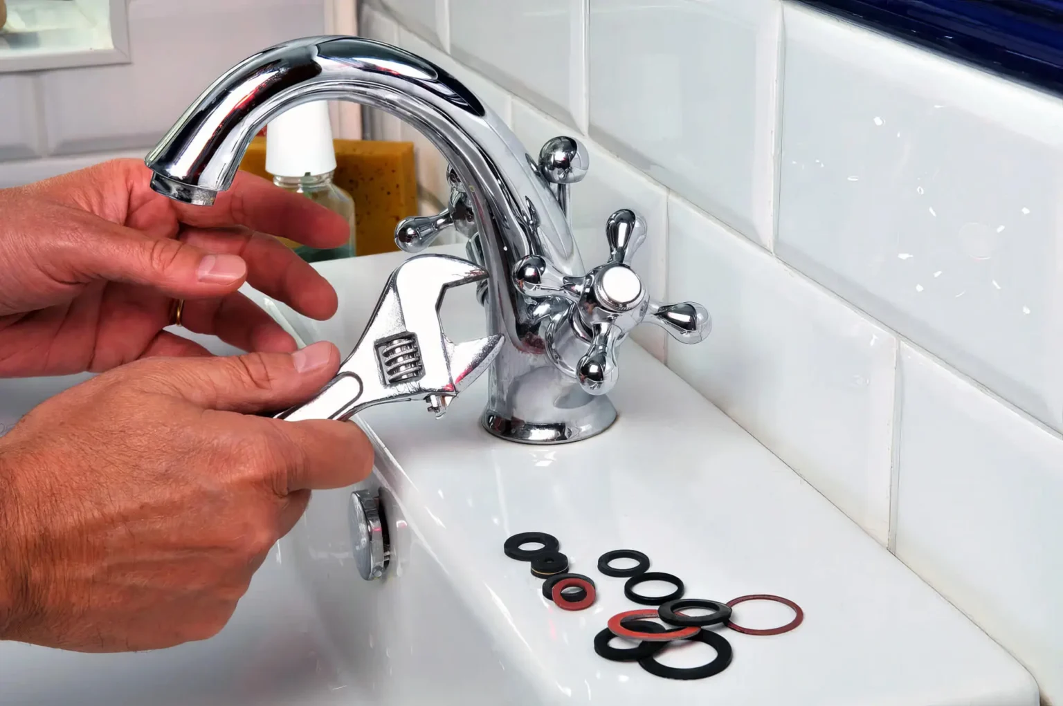 Plumber maintaining a bathroom faucet in Simi Valley