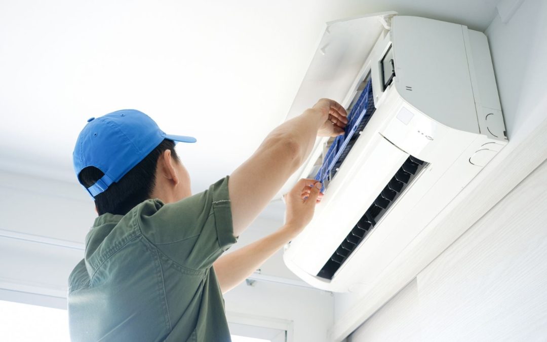 HVAC technician servicing a ductless mini split in Simi Valley